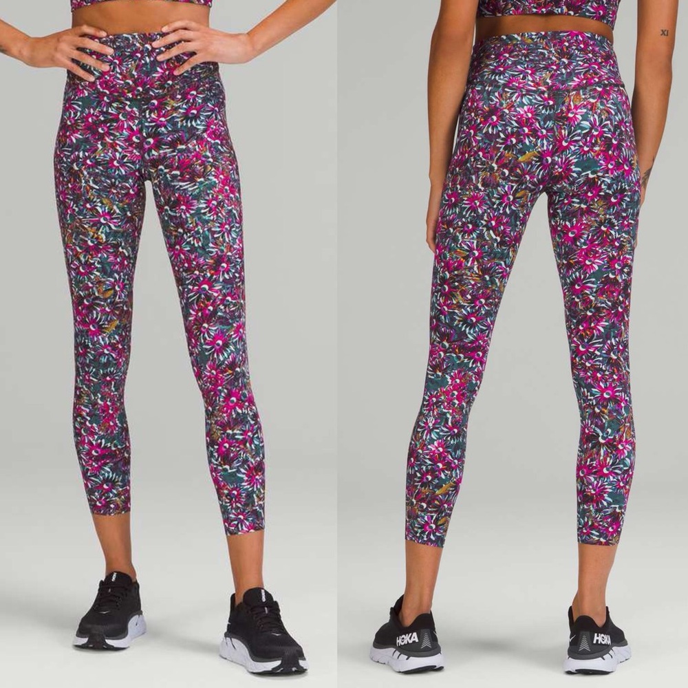 Lululemon Base Pace High-Rise Running Tight 25"
Floral Electric Leggings.     B